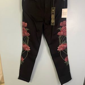 DG2 black jeans with red rosé embroidered legs. Size 8. NWT.